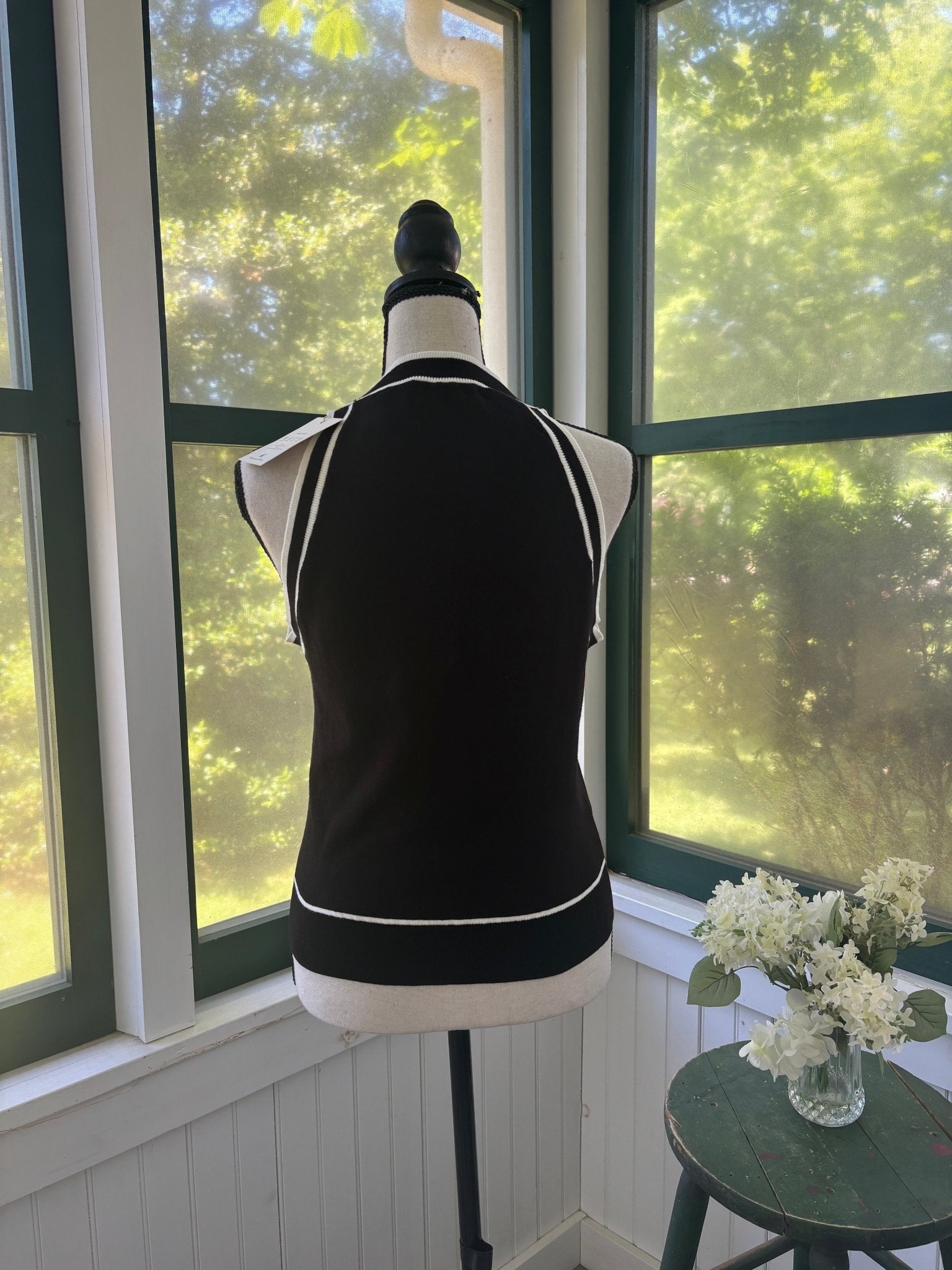 Miholl black knit tank top back view showing white contrast trim, size large