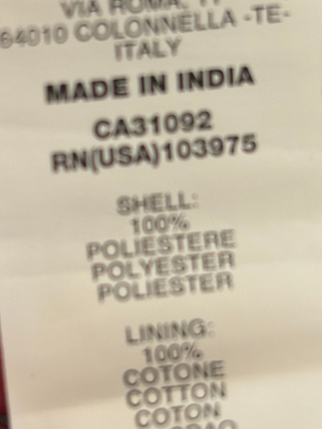Interior fabric label showing 100% polyester shell and 100% cotton lining, Miss Sixty Collection