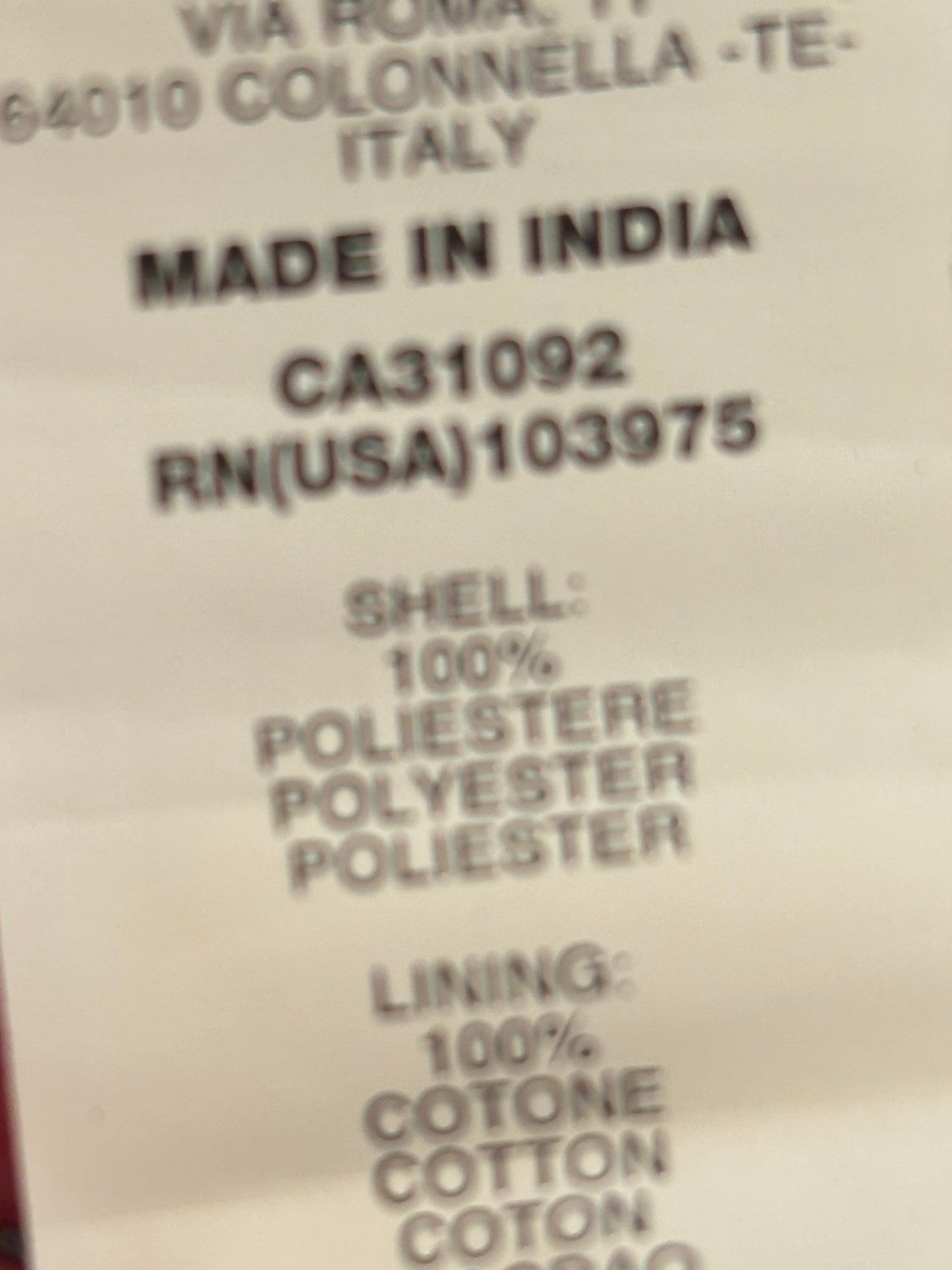 Interior fabric label showing 100% polyester shell and 100% cotton lining, Miss Sixty Collection