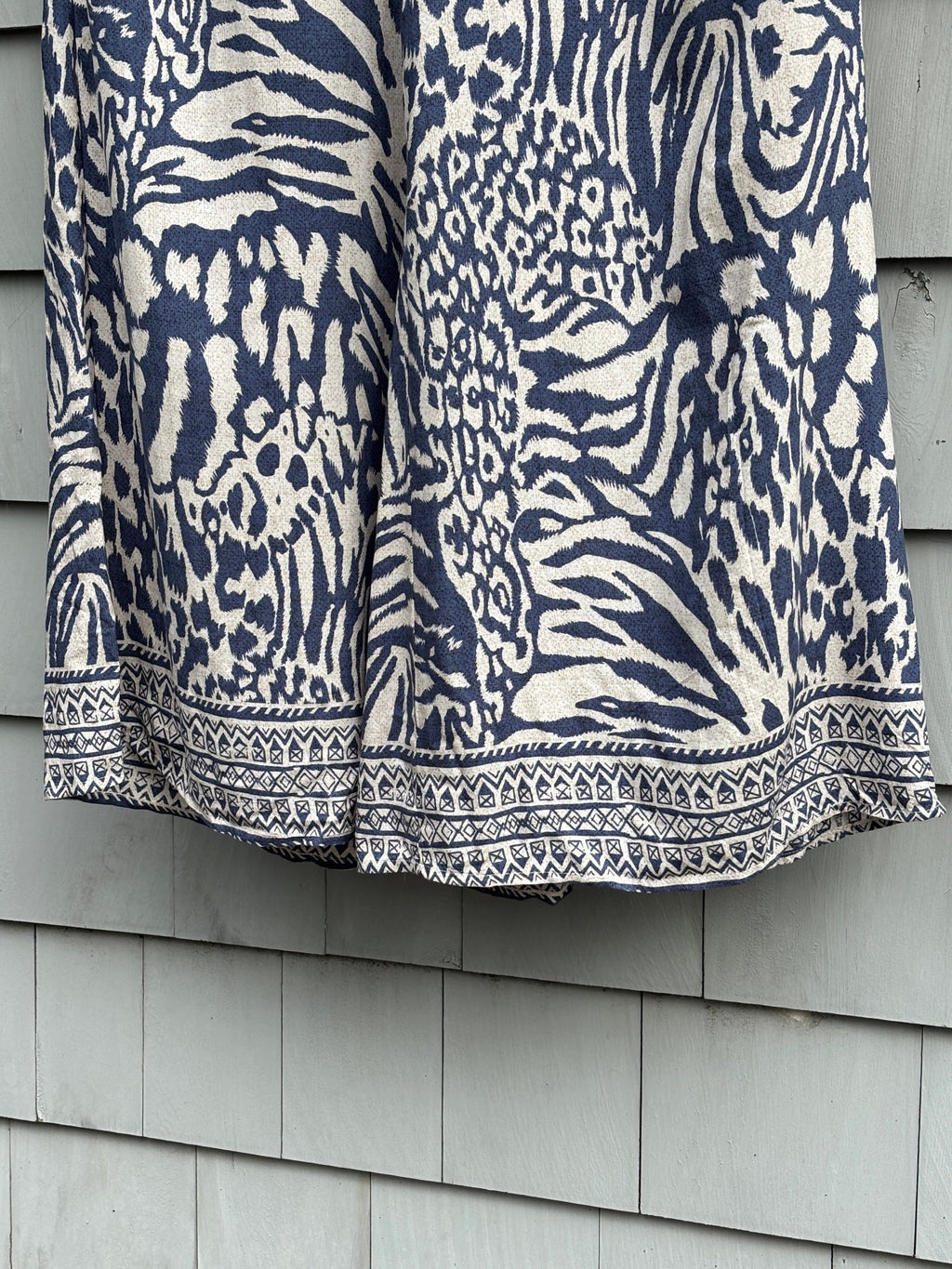 Molly Bracken wide leg pants size XL navy cream animal print tribal border hem detail