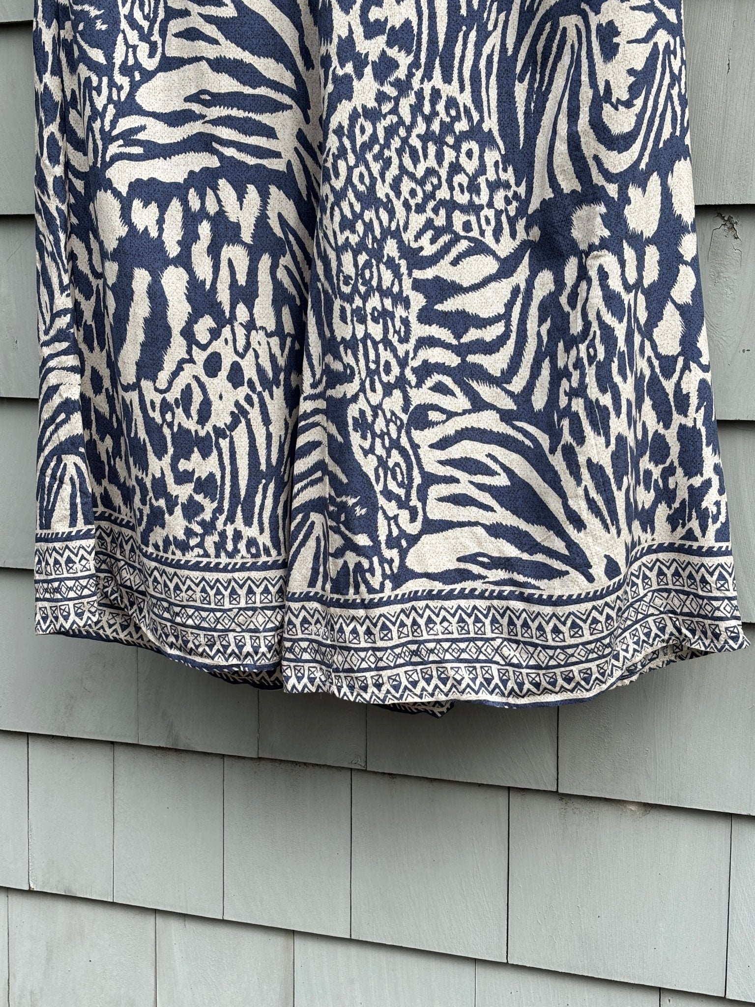 Molly Bracken wide leg pants size XL navy cream animal print tribal border hem detail