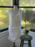 Monrow white ruched mini dress front view on mannequin showing V-neckline and side ruching at hip, size Medium NWT