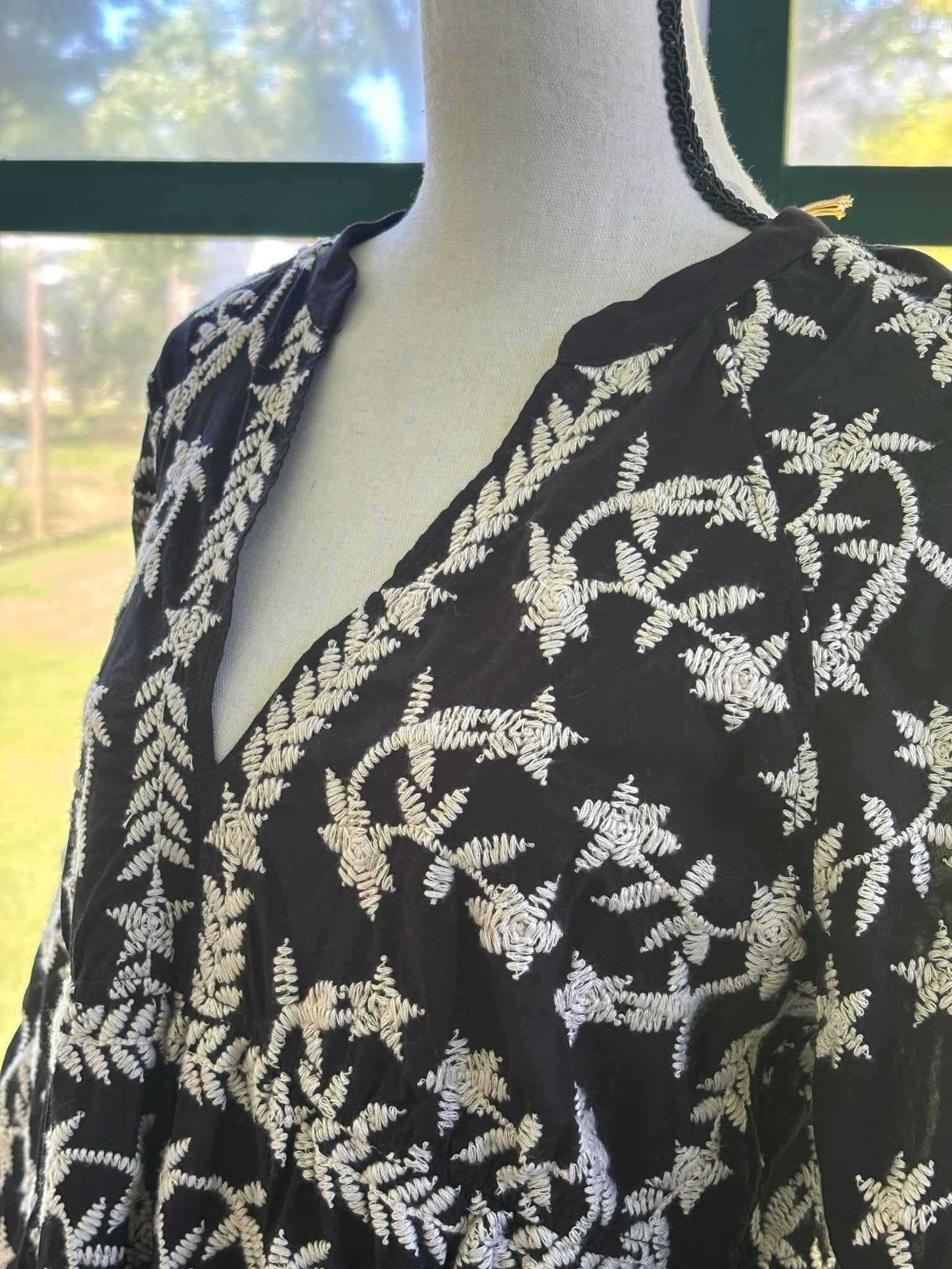 Nema Resort Wear Tatiana Dress black cream botanical embroidery V neck detail close up NWT