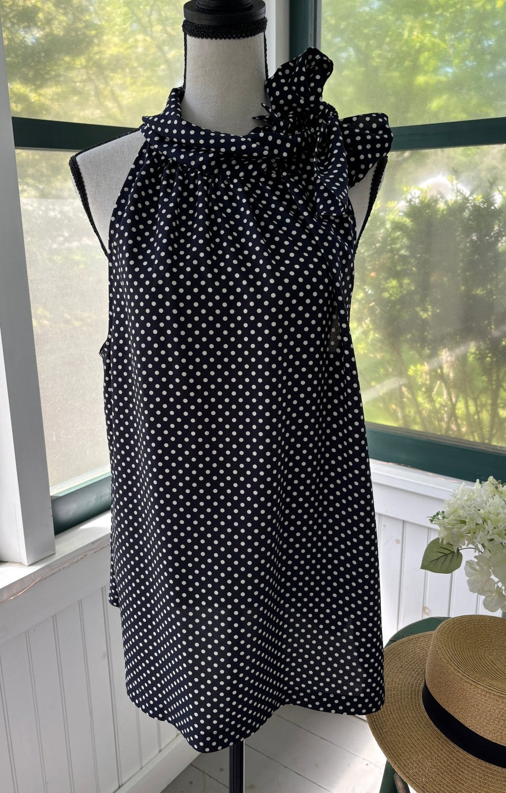 Juicy Couture navy polka dot top front view flowy silhouette scalloped hem like new Sassy and Chic