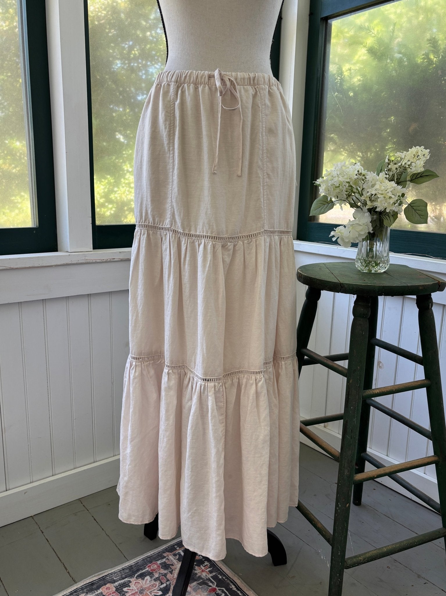 NWT Splendid Collection natural ecru tiered maxi skirt with drawstring waist on dress form, full front view