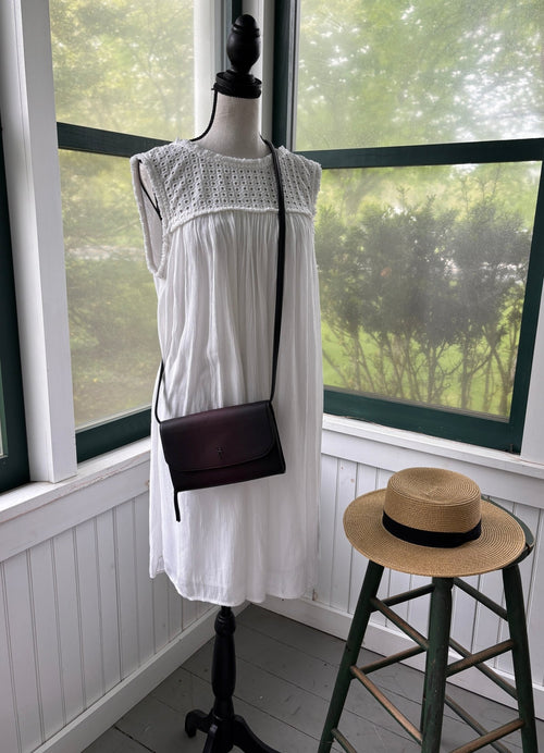 Structured chocolate brown crossbody bag styled on mannequin thrifted crossbody bags like new Sassy and Chic