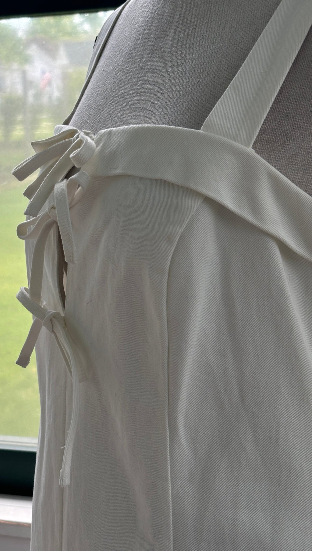 Minkpink Imogen Drill Tie Mini Dress white three bow tie detail close up thrifted dresses Sassy and Chic