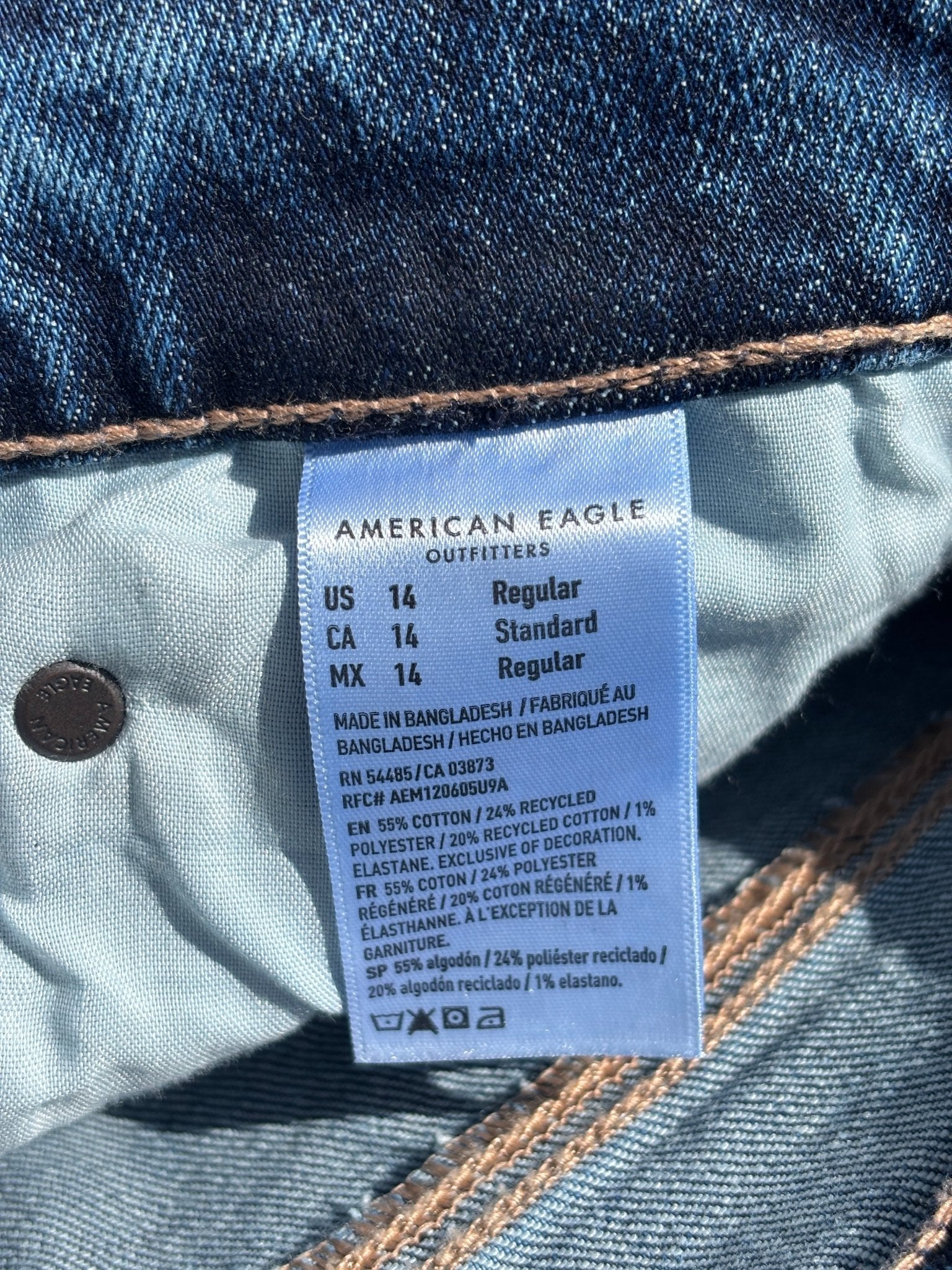 AEO Curvy Stovepipe dark wash jeans care label sustainable fabric blend like new Sassy and Chic