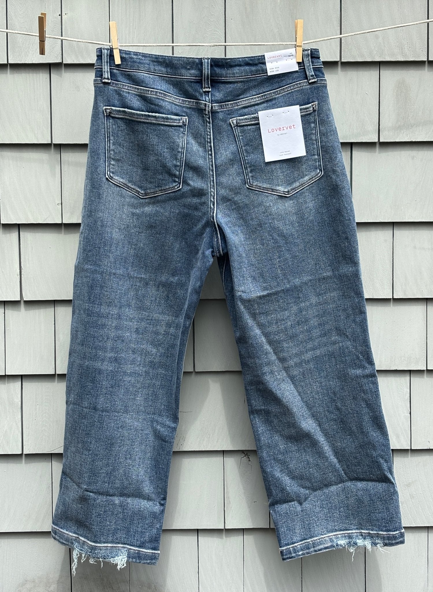 Lovervet high rise wide leg crop jeans back view raw frayed hem thrifted jeans new with tags Sassy and Chic