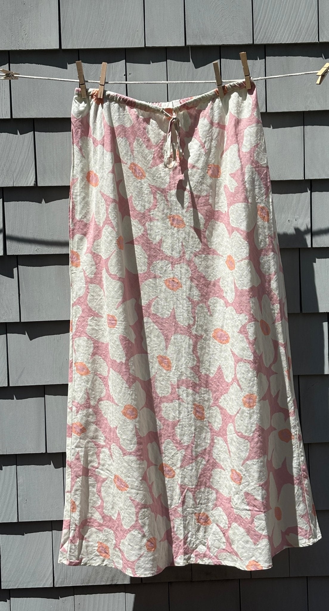 Rhythm Mimi Floral Maxi Skirt front view blush pink white floral thrifted skirts new with tags Sassy and Chic
