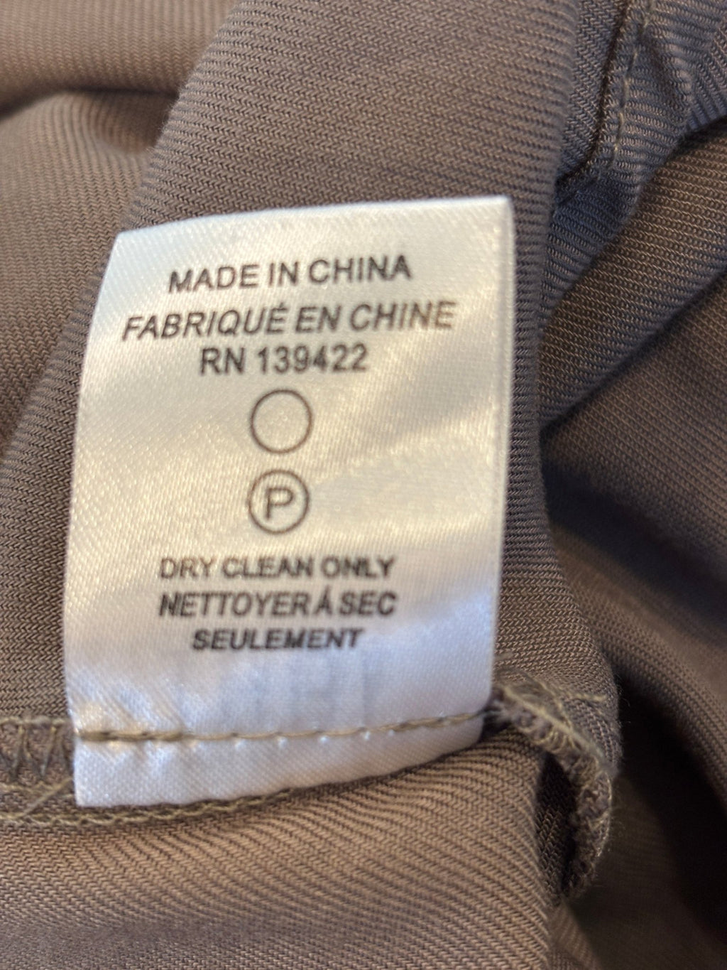 Care label showing dry clean only, Tobi taupe mini dress