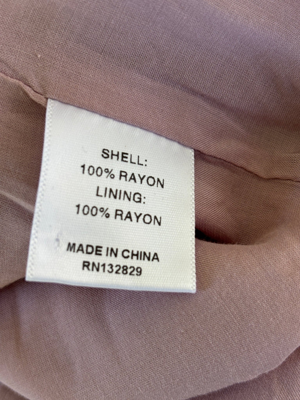 Tularosa crossback midi dress size medium 100 percent rayon shell lining made in China