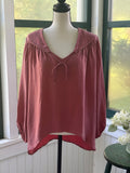 Young Fabulous & Broke dusty rose peasant blouse, front view on mannequin showing V-neck and tie detail